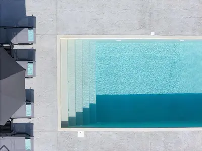 an overhead view of a swimming pool at Olive Garden Villa 5 min from Golden Beach in Galatás