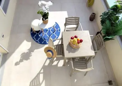 an overhead view of a table with a bowl of fruit at Cherry Central Luxury Suites in Chania Town