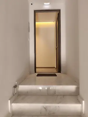 an empty corridor with a door in a room at Sandy Suite 2 in Agia Marina Nea Kydonias