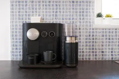 a coffee maker sitting on a counter in a kitchen at Everlane Seaview Villa in Arménoi