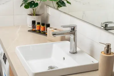 a white sink in a bathroom with a mirror at The Sandgate Elegant studio, Chania Seaside in Chania Town