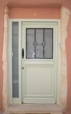 a white door with a window in a building at Casa Elysium - Chania Old City in Chania Town