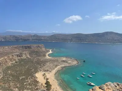 an aerial view of a beach with boats in the water at KerAsh Villa Drapanias in Kissamos