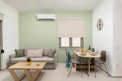 a living room with a couch and a table at Casa Makda in Parigoría