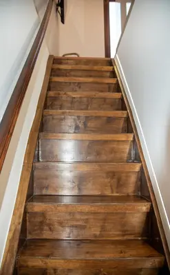 a set of stairs in a house with wood at Casa Dione - Chania Old Town in Chania Town