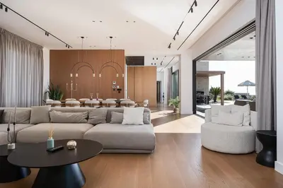 a living room with a couch and a table at Kiyomi Villa in Chania Town