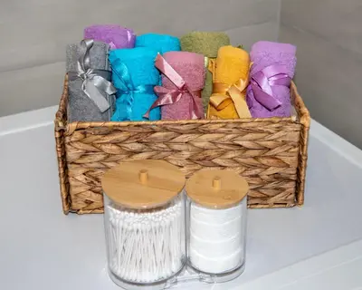 a basket filled with different colored towels and thread at Cozy Rena luxury apartment with free private parking in Chania Town