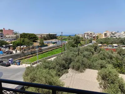 a view of a city from a balcony at Despoina's Sea View Apartment in Chania Town