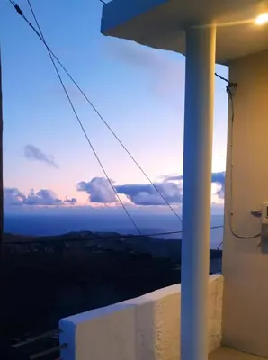 a view of the ocean from a house at Agnanti in AsfendhilÃ©s