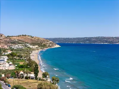 an aerial view of a beach and the ocean at Panorama Seaview Village at Kalyves in Kalyves