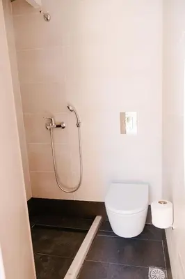 a bathroom with a toilet and a shower at Be Crete - Villa Erofili in Chania Town