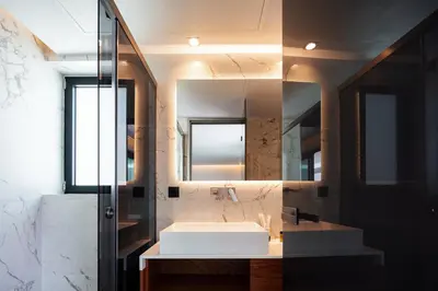 a bathroom with a sink and a mirror at Nuera Villas in Chania Town