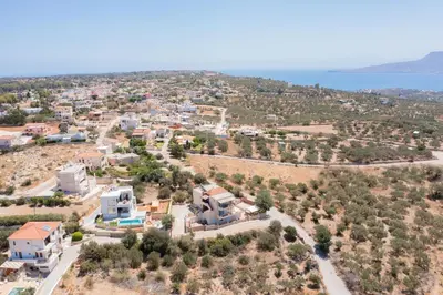 an aerial view of a town with houses and trees at Serenity in Stérnai