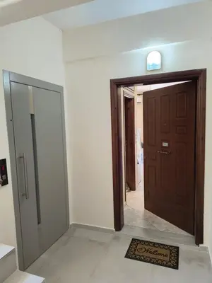 an empty room with a door and a rug at Angie A2 close to the beach by 8essentially in Chania Town