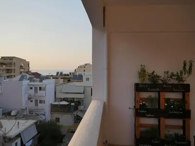 a view of a city from a balcony at Gio's Central Cosy Apartment with private balcony in Chania Town