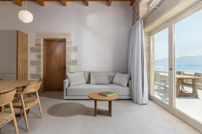 a living room with a couch and a table at Villa Maistros in Kissamos