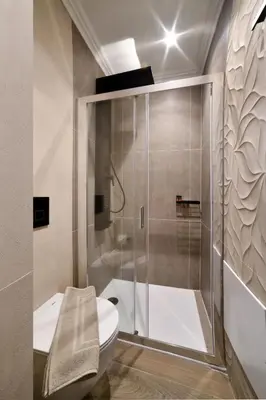 a bathroom with a shower with a toilet and a sink at Casa Kallisti in Chania Town