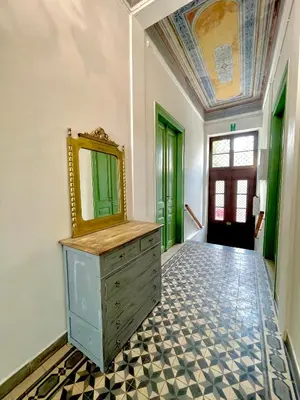 a dressing room with a mirror and a dresser at La Sistina in Chania Town