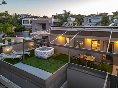 a balcony of a house with a swimming pool at Panorama View Apt with Jacuzzi by 8essentially in Daratso