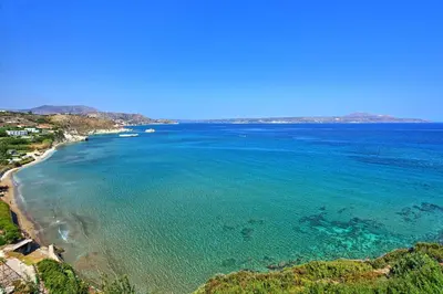 an aerial view of a beach and the ocean at Villa Sapphire by PosarelliVillas in Almirida