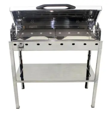 a grill on a stand with a white at Helen in Pírgos Psilonérou
