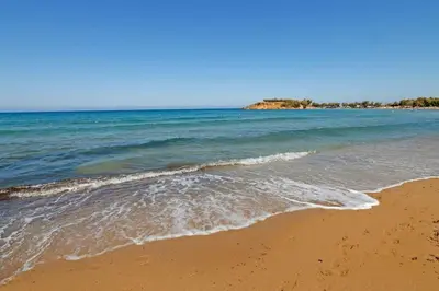 a view of the beach with the ocean at Astrinos Apartment Simple cozy comfortable close to the beach in Chania Town