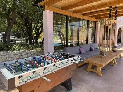a large chess board on a table in a patio at Villa Galania Armeni Crete in Arménoi