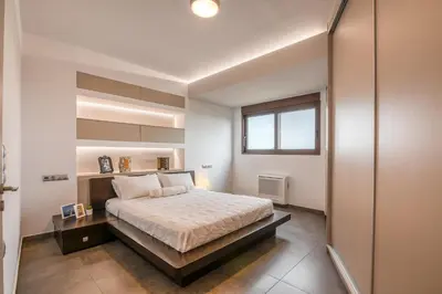 a bedroom with a bed and a window at VenMar luxury house in Plataniás