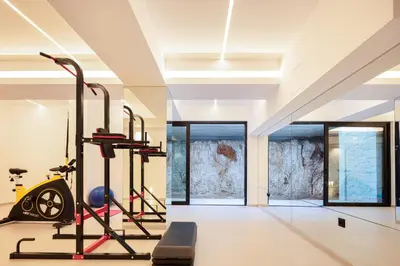 a gym with a treadmill and exercise equipment at Avery Villa in Chania Town