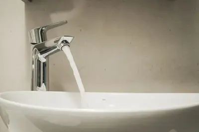 a sink with a water faucet in a bathroom at Afrodite-Μεζονέτα στην πόλη Χανιά in Chania Town