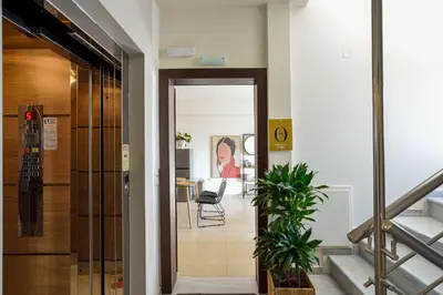 a hallway with a stairway leading to a room at Ionia Cozy Home in Chania Town
