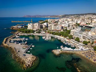 an aerial view of a harbor with boats in the water at Sea View Modern 2BR Top Floor on Nea Chora Beach in Chania Town