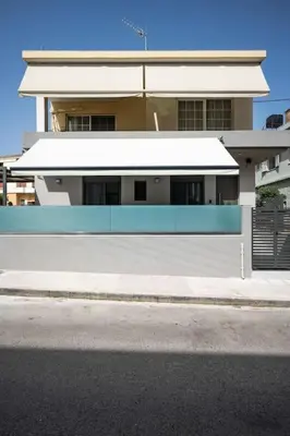 a building on the side of a street at Erato - Newly renovated Home with Parking in Chania Town