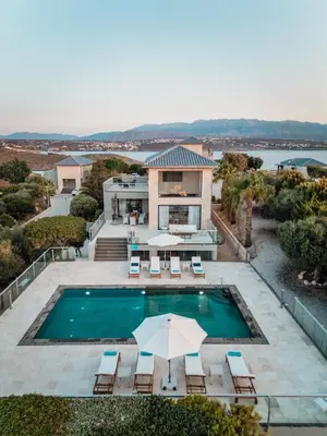 an aerial view of a house with a swimming pool at Villa Shell in Tersanas