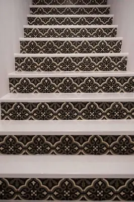an image of a black and white patterned staircase at Citrus Daliani Rooms in Chania Town