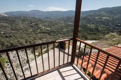 a view from the balcony of a house at Aori Hillside Villa in Kántanos