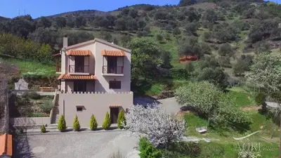 an aerial view of a villa in the hills at Aori Hillside Villa in Kántanos