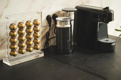 a black counter top with an abacus and a heater at Lovelia Luxury Apartment Chania EV Car Wallbox in Chania Town
