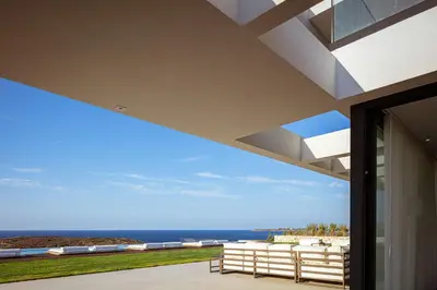 a view of the ocean from inside a house at Villa Mika in Chania Town