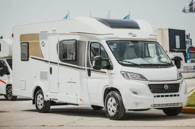a white camper truck parked in a parking lot at CamperLifeCrete in Chania Town