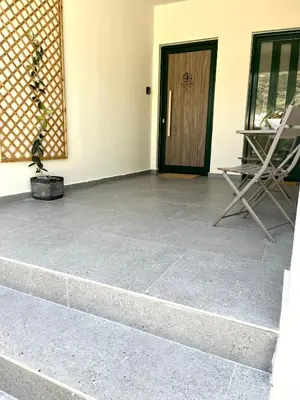 an empty patio with a door and a plant at Elirion Luxury Home II in Kamária