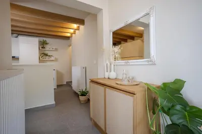 a kitchen with a sink and a mirror at Elirion Luxury Home II in Kamária