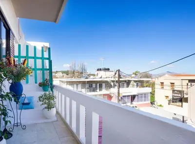 a balcony with a view of a city at Irini Apartment I in Kalyves