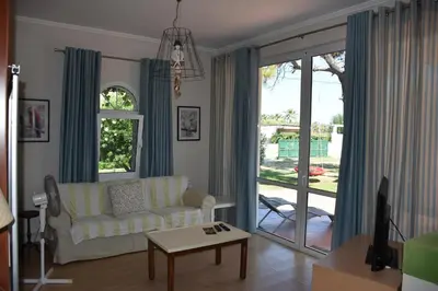 a living room with a couch and a table at Villa Gerani in Gerani Chanion