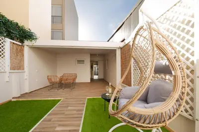 a room with a hammock in the middle of a house at Callista City Living III in Chania Town