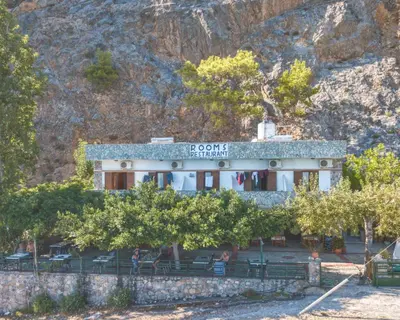 a building on the side of a mountain at Sweet Corner Masxali in Agia Roumeli