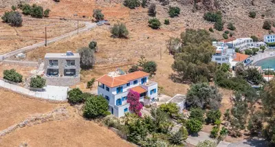 an aerial view of a house on a hill at Michalis-Nina studios in Livanianá