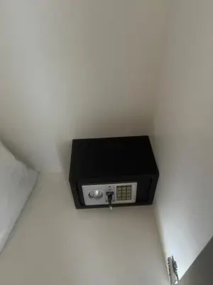 a small box on the wall in a room at Michalis-Nina studios in Livanianá