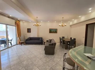 a living room with a couch and a table at Angie A1 close to the beach by 8essentially in Chania Town