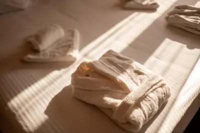 a roll of toilet paper sitting on a table at Giannoulis Ele Villas in Skoutelónas